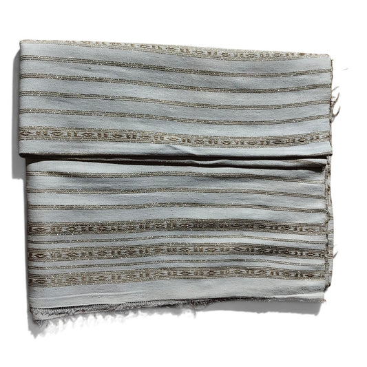Honnihonjeng handwoven fabric in light grey with intricate metallic gold striped patterns and textured weave.