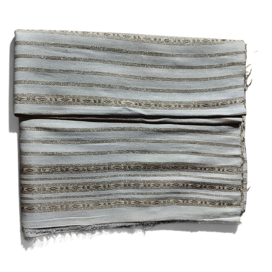 Honnihonjeng handwoven fabric in light grey with intricate metallic gold striped patterns and textured weave.