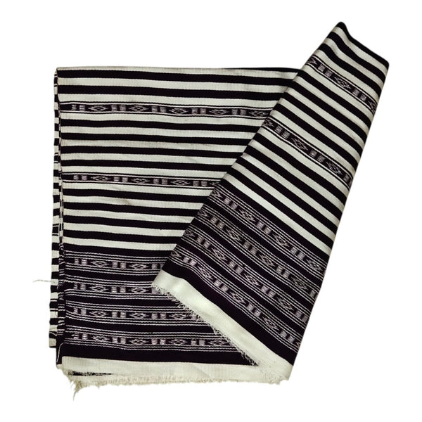 Honnihonjeng handwoven textile fabric featuring a monochrome black and white striped design with geometric patterns.