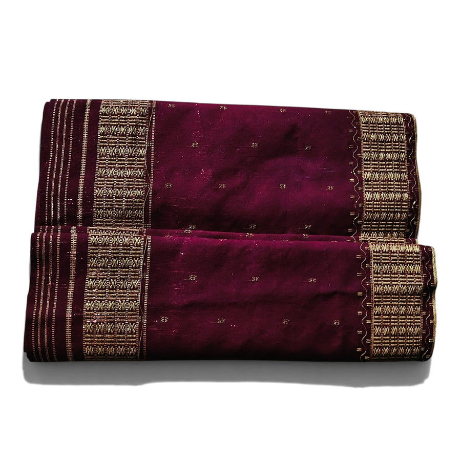 Honnihonjeng plum-coloured handwoven fabric with intricate metallic gold woven borders and subtle textured patterns.